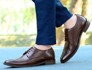 Open-lacing design detail of brown Derby Shoes highlighting classic craftsmanship
