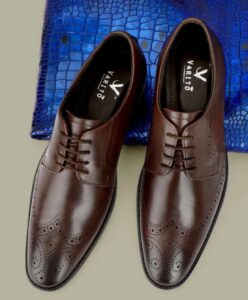 Close-up of premium brown leather texture on Derby Shoes showing quality details